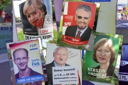 Umgestaltete Wahlplakate: Angela Satan und Kiffer-Kerstin