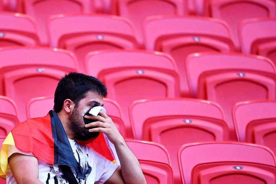 Ein trauriger Deutschlandfan, der allerdings nicht wegen der Länderspielpause weint. (Foto: Chen Yichen)